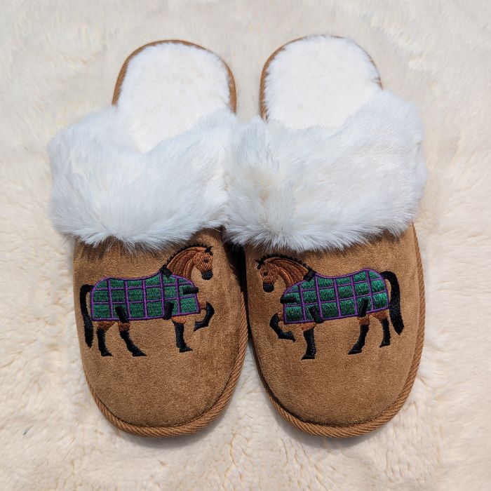 Super cozy faux fur slippers. Your feet can be just as cozy as your best friend! Exclusive art by horse artist Gary Guderian. High quality memory foam base, 100% Polyester. Available in two sizes: S/M (US Women's Size 7/8) and L/XL (US Women's Size 9/10). Each pair of slippers comes on a plastic hanger, with sewn in care label and size molded into base of slipper.