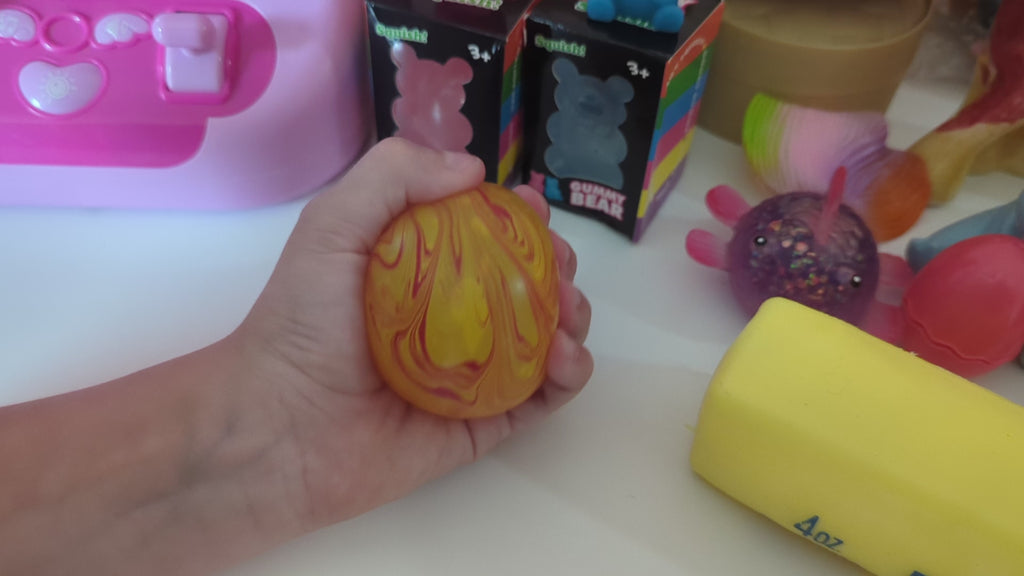 2" Slow Rise Swirl Orb Squishy, Display of 12